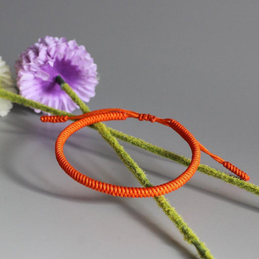 Orange Braided Buddhist Lucky Bracelet