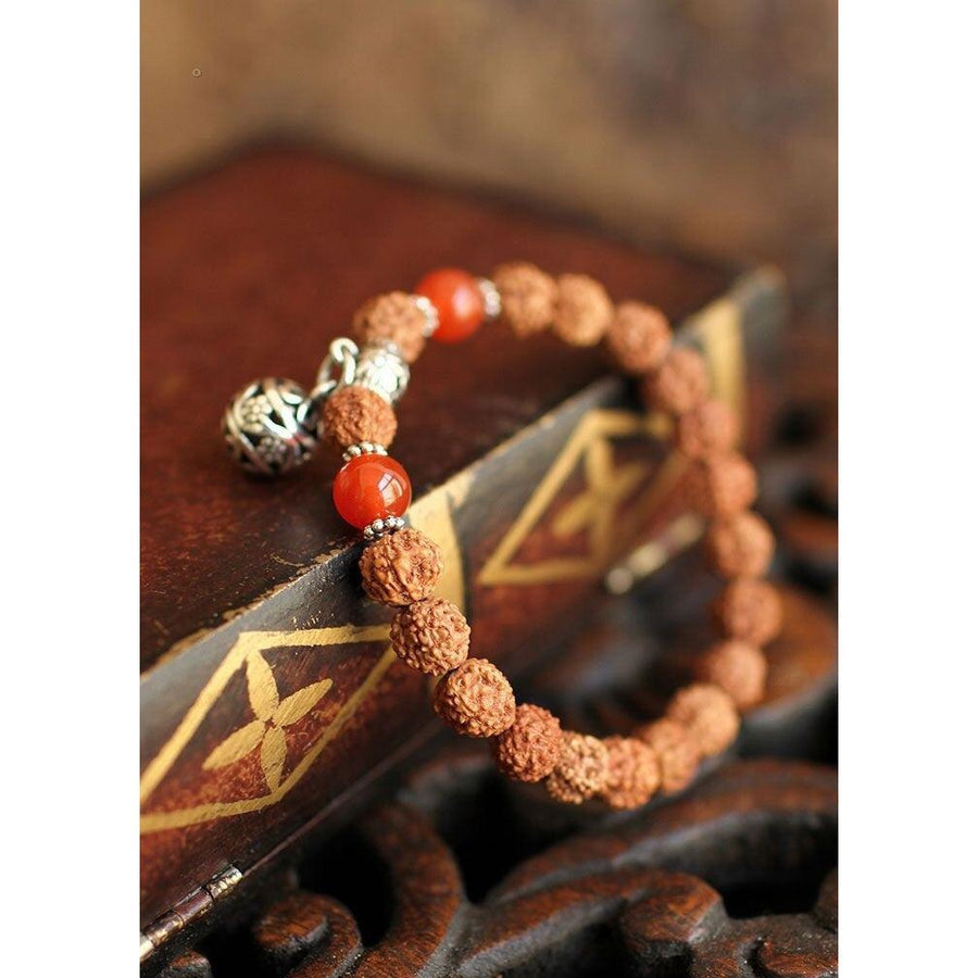 Tibetan Red Onyx and Rudraksha Charm Bracelet