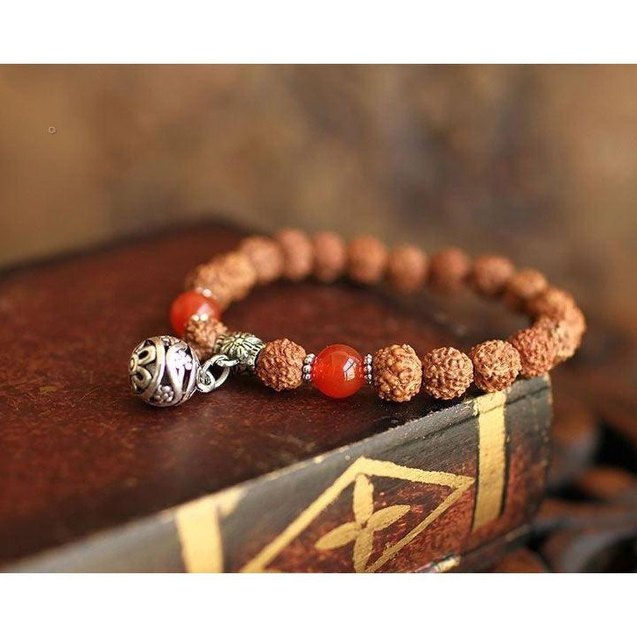 Tibetan Red Onyx and Rudraksha Charm Bracelet