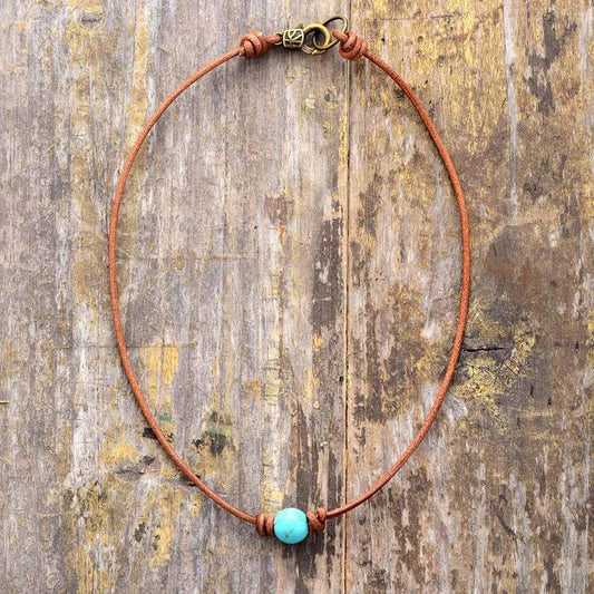 Spirituality Necklace with Turquoise Bead on Leather Cord