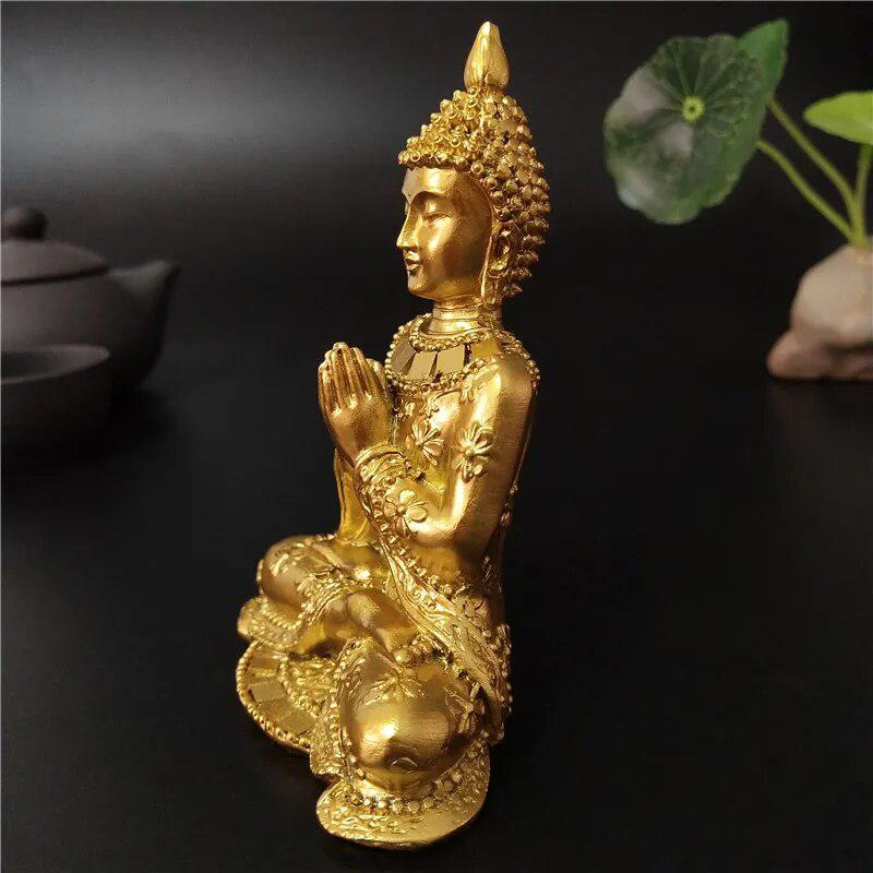 Gold Buddha Statue in Namaste Pose