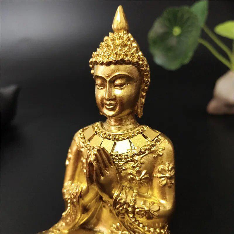 Gold Buddha Statue in Namaste Pose