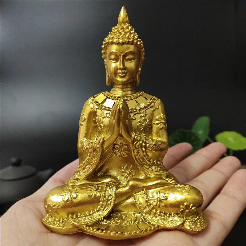 Gold Buddha Statue in Namaste Pose