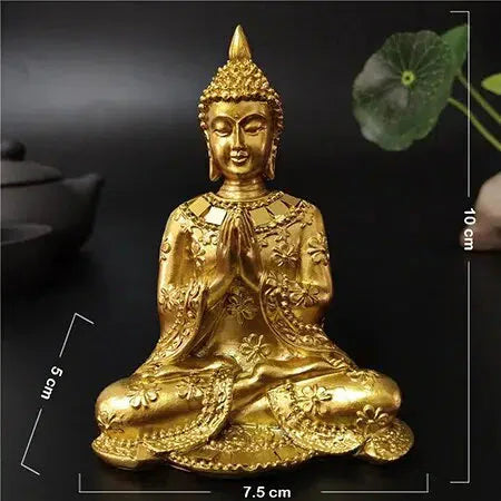 Gold Buddha Statue in Namaste Pose